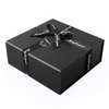 black-cardboard-gift-box-with-crossing ribbon